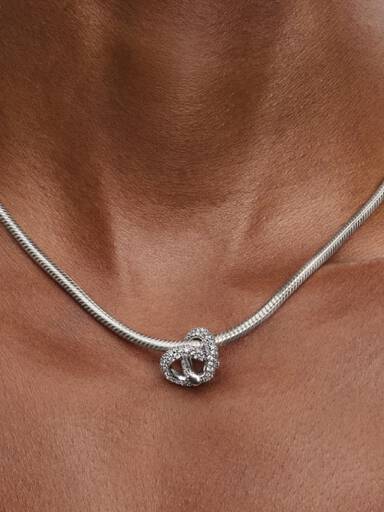 Charm Corazón Nudo Infinito y Pavé