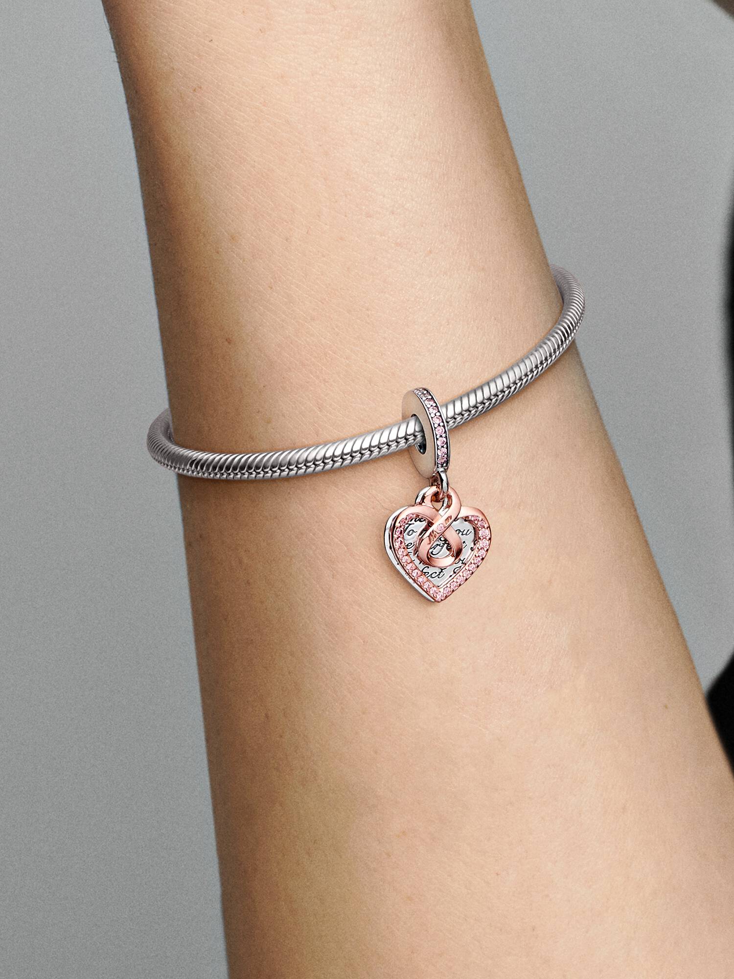 Charm Colgante Doble Corazón Infinito en Dos Tonos