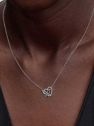 Collar Corazón y Mariposa Entrelazados